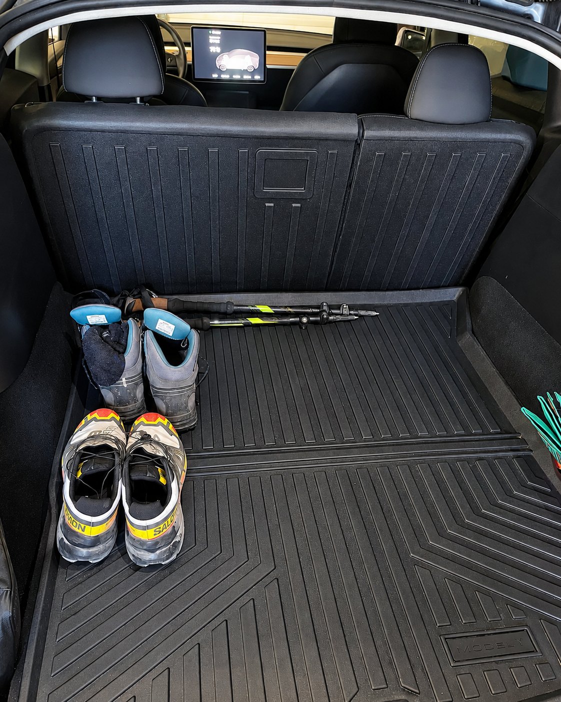 Clean Tesla cargo area after detailing